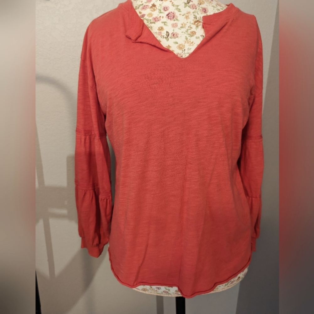 Coral Tribal top with sleeve accents and cut raw hem